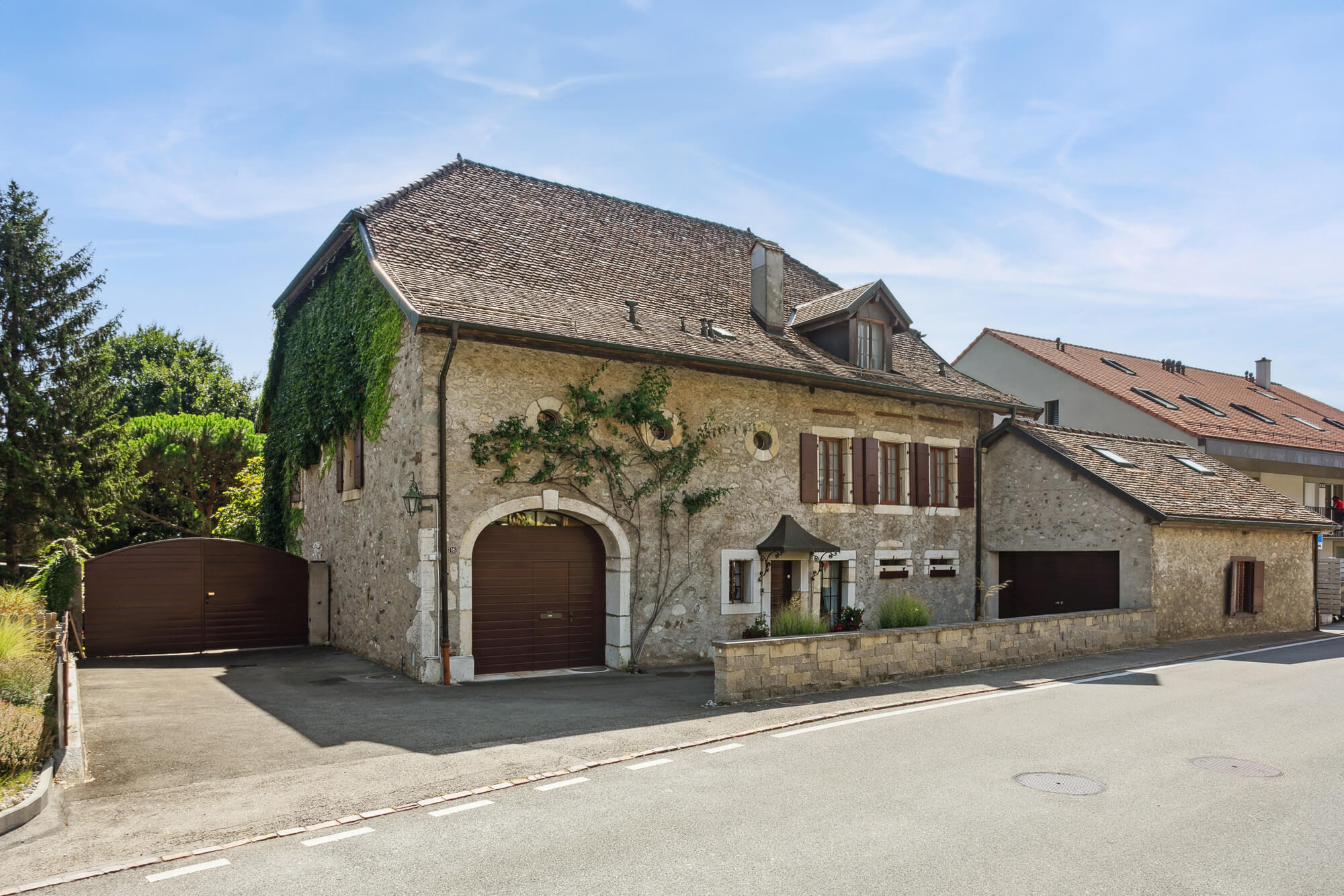 Elegant 19th Century Village-Style Property with Outdoor Pool and Expansive Wooded Grounds