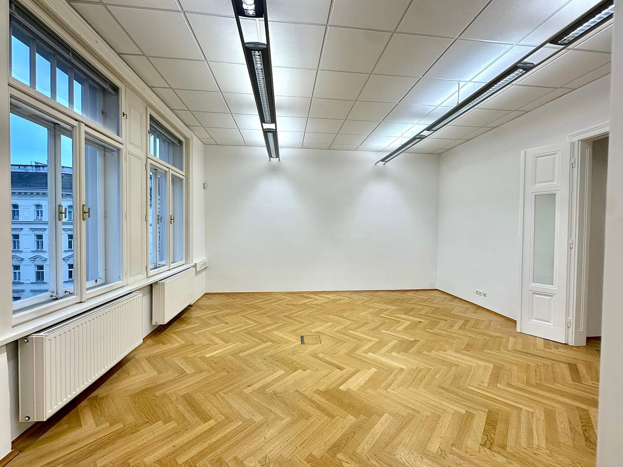 Light-flooded office in old building near Mariahilfer Straße