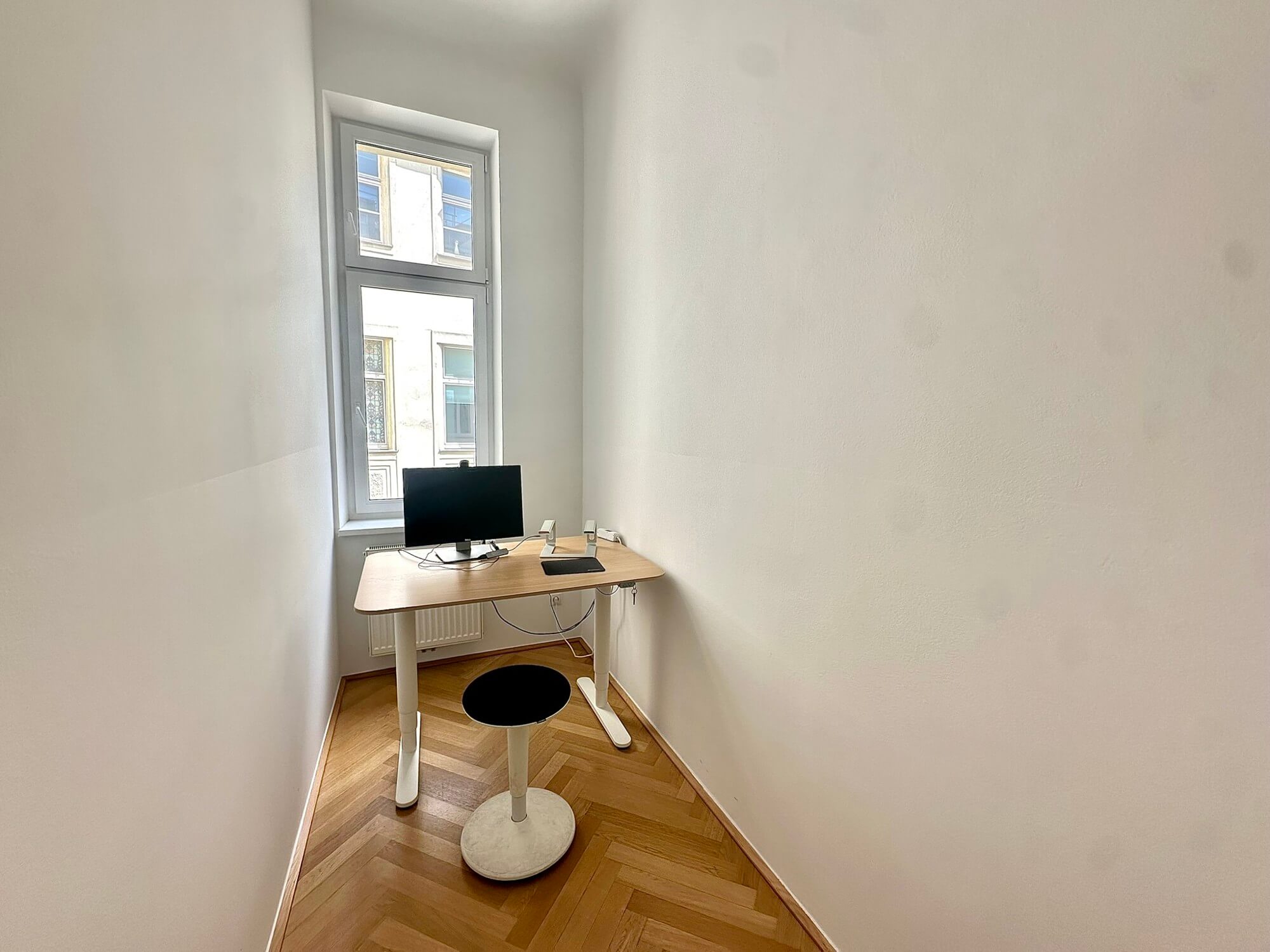 Light-flooded office in old building near Mariahilfer Straße