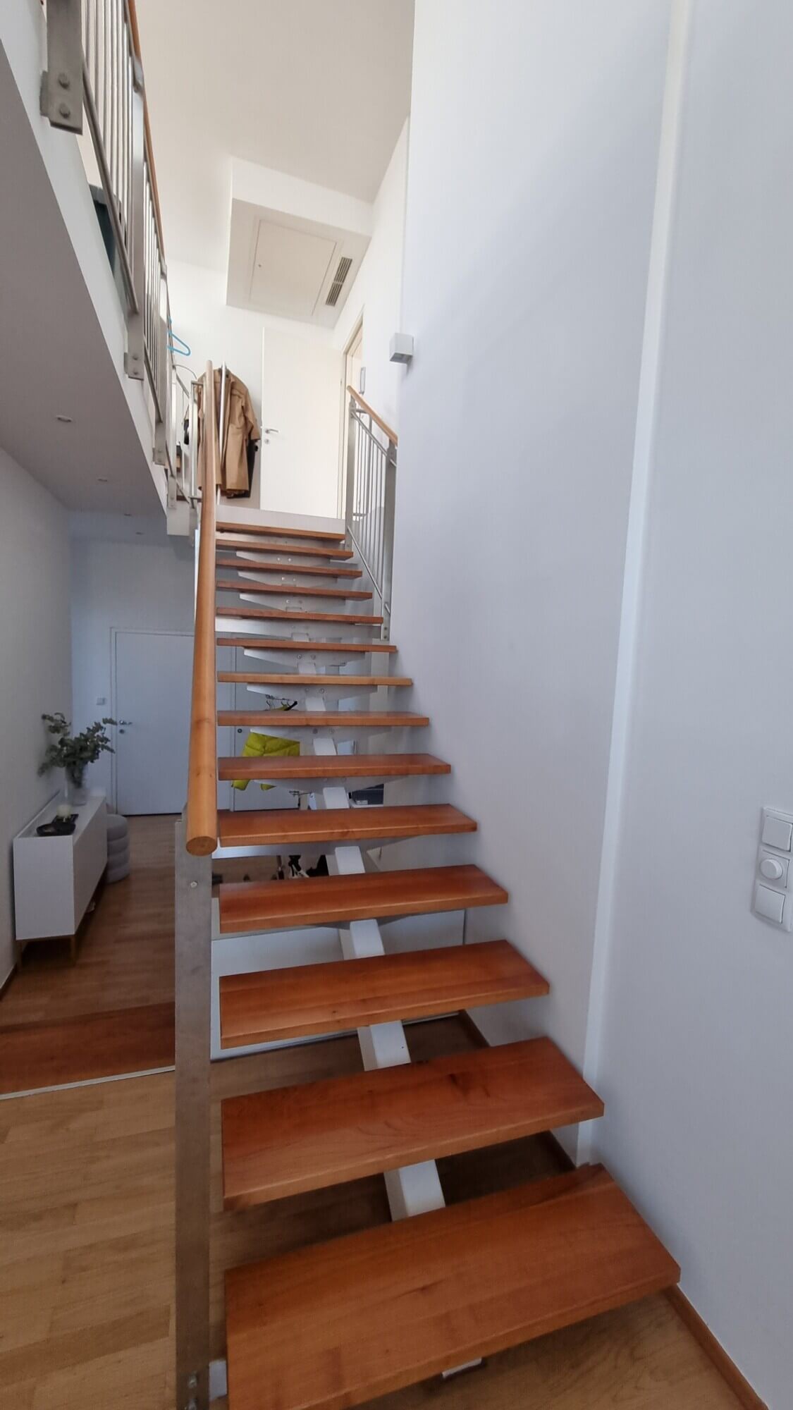 Attic duplex apartment with two terraces