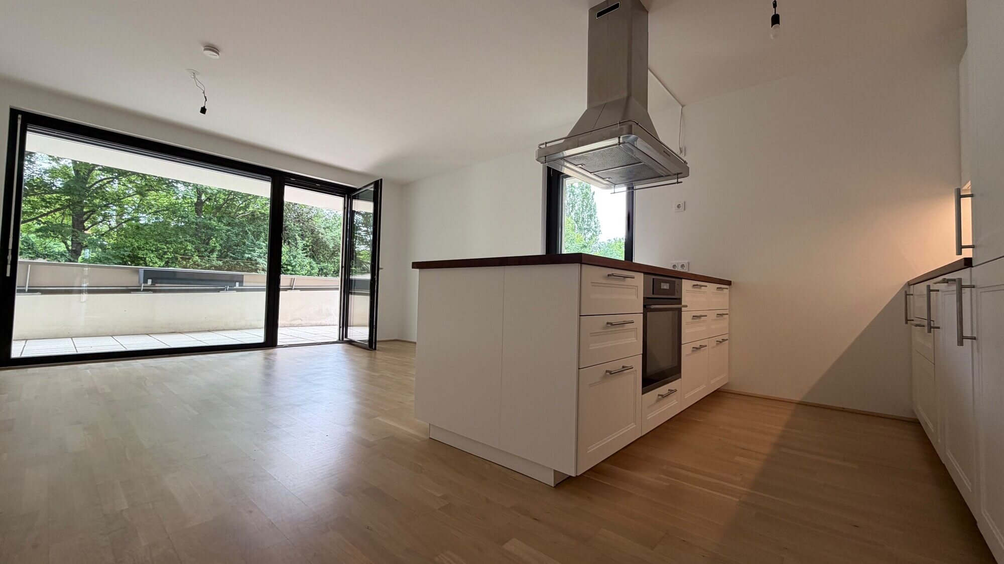 Peaceful green setting with direct views of Otto Benesch Park