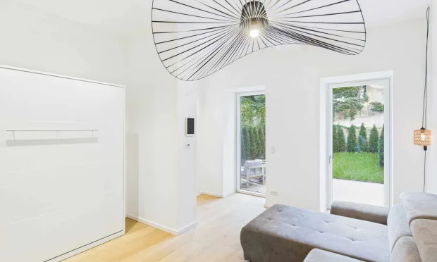 Moderne Gartenwohnung in Wien: Erdgeschoss mit Terrasse und Grünfläche