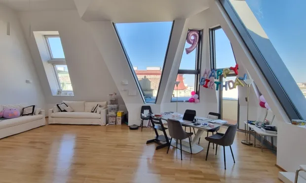 Attic duplex apartment with two terraces