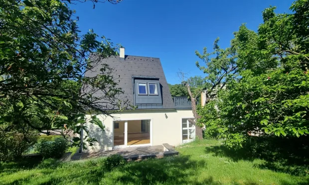 Modern single-family house with garden for rent in Dornbach.